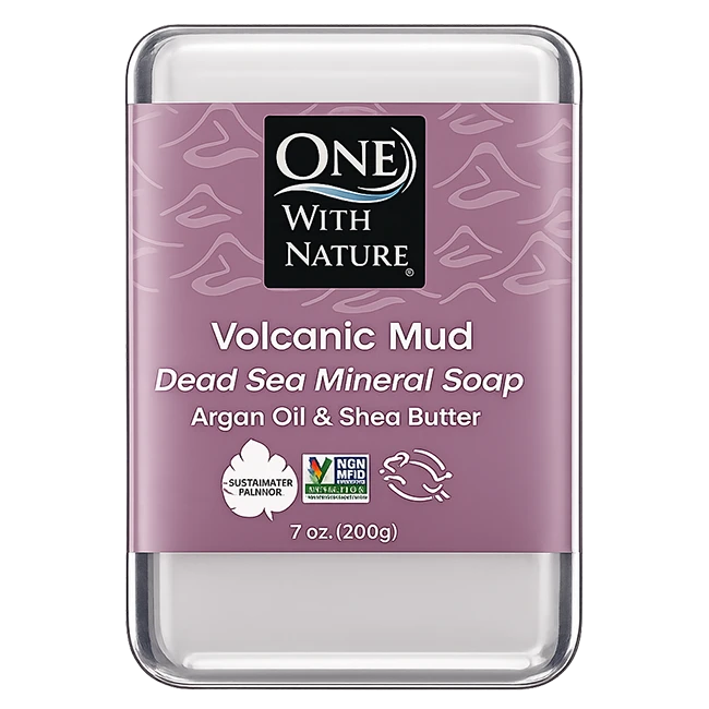 One With Nature Volcanic Mud Dead Sea Mineral Soap with argan oil and shea butter in a purple product package.